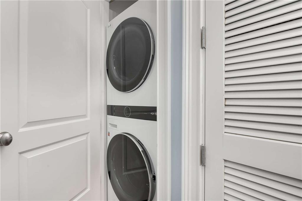 1055 Piedmont Avenue Northeast, Unit 114 Atlanta, GA 30309 - Photo 19 of 40 a utility room with dryer and washer