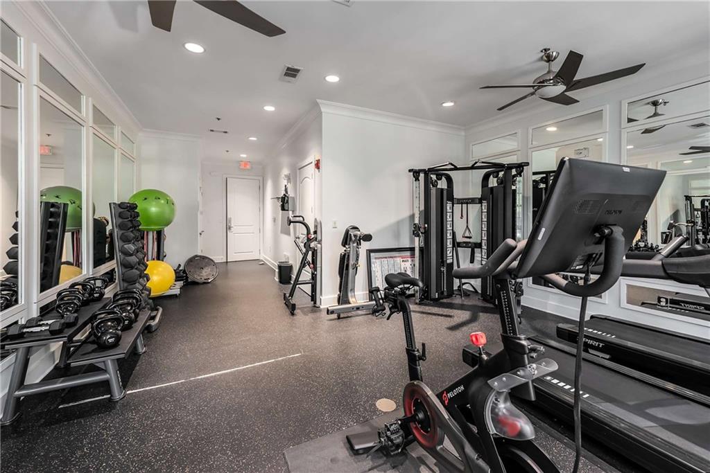 1055 Piedmont Avenue Northeast, Unit 114 Atlanta, GA 30309 - Photo 22 of 40 a view of a room with gym equipment