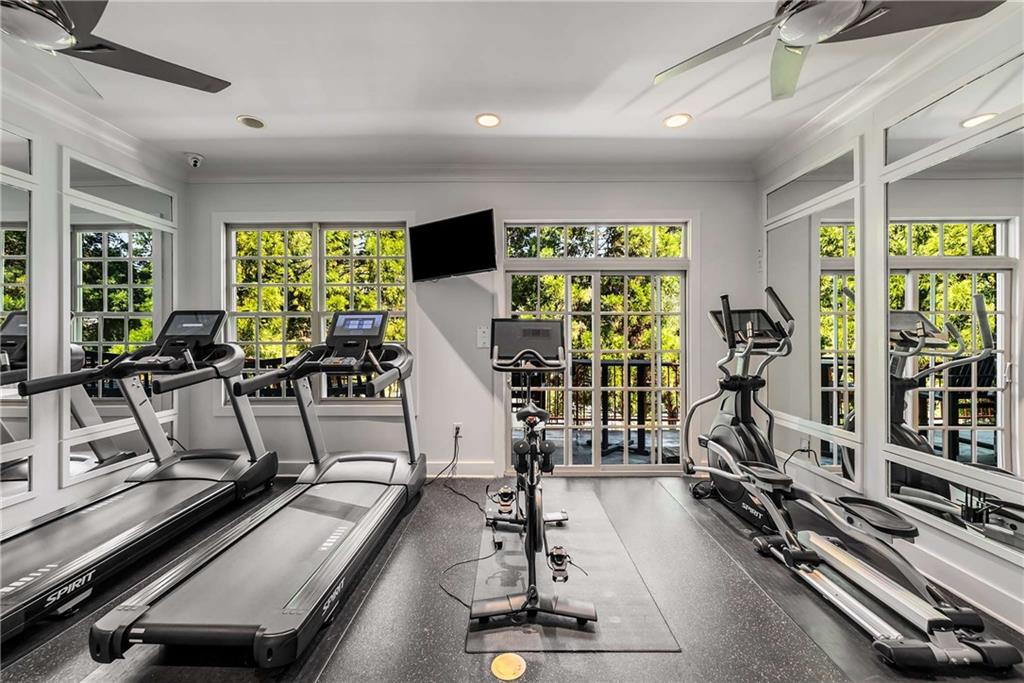 1055 Piedmont Avenue Northeast, Unit 114 Atlanta, GA 30309 - Photo 23 of 40 a view of a room with gym equipment