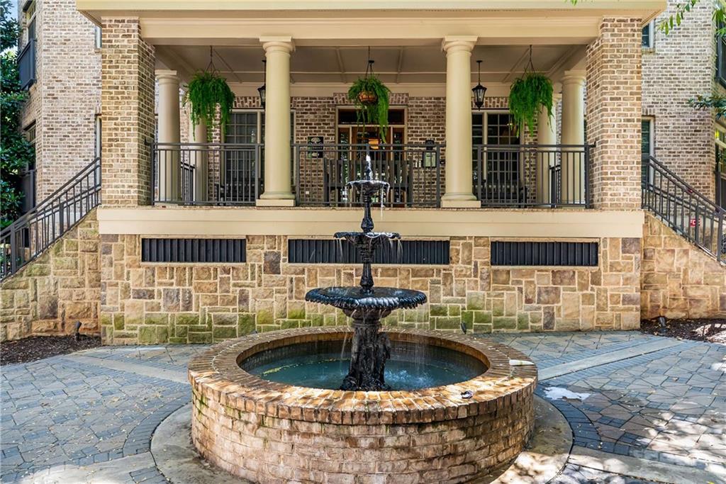 1055 Piedmont Avenue Northeast, Unit 114 Atlanta, GA 30309 - Photo 29 of 40 a large building with granite in front of it
