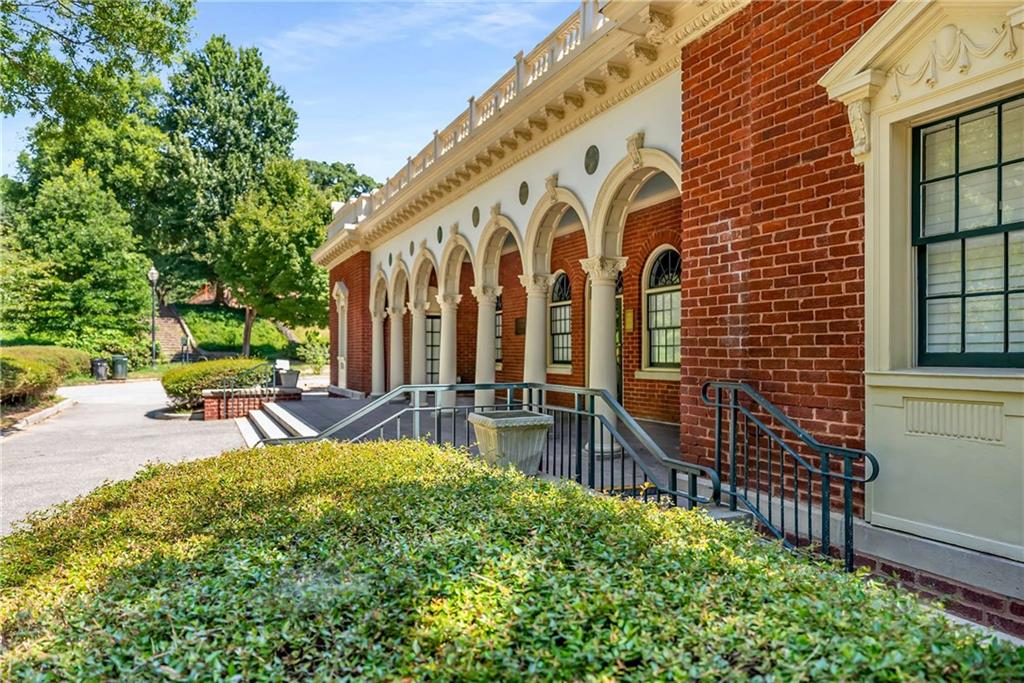 1055 Piedmont Avenue Northeast, Unit 114 Atlanta, GA 30309 - Photo 34 of 40 a view of a house with backyard and sitting area
