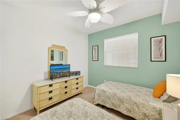 a bathroom with a sink toilet and vanity