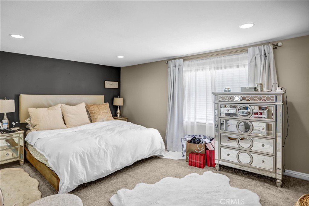 6280 Kinlock Avenue Rancho Cucamonga, CA 91737 - Photo 16 of 24 a bedroom with a bed and a window