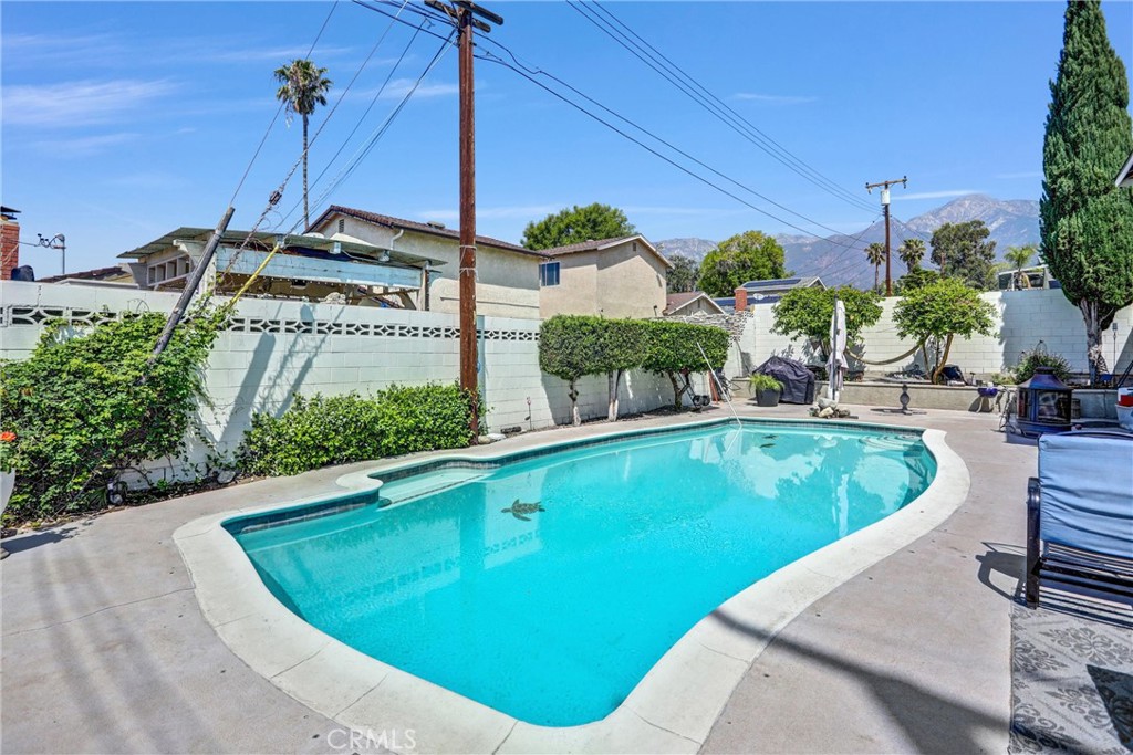 6280 Kinlock Avenue Rancho Cucamonga, CA 91737 - Photo 20 of 24 a view of a swimming pool with a patio