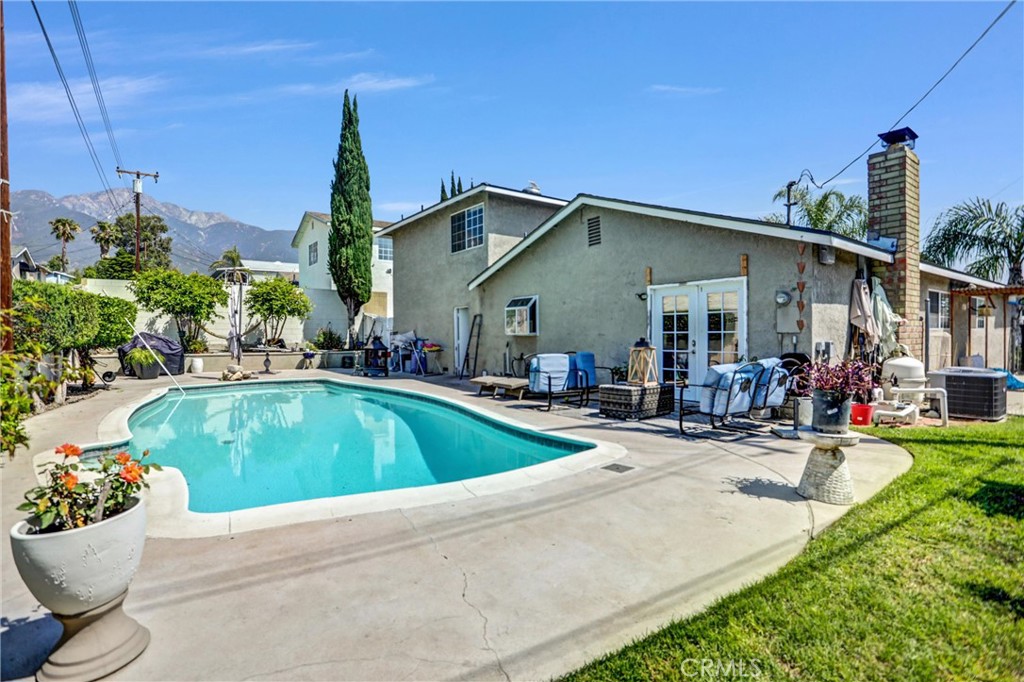 6280 Kinlock Avenue Rancho Cucamonga, CA 91737 - Photo 21 of 24 a view of a house with swimming pool and sitting area