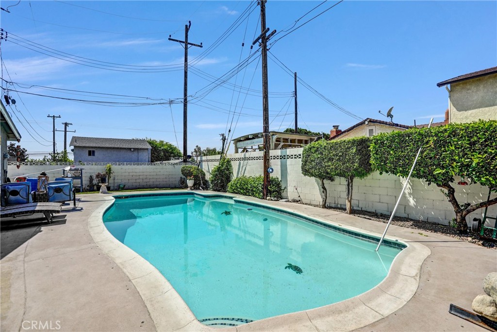 6280 Kinlock Avenue Rancho Cucamonga, CA 91737 - Photo 22 of 24 a view of a swimming pool with chairs