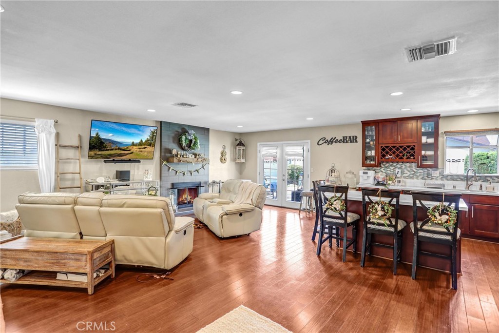 6280 Kinlock Avenue Rancho Cucamonga, CA 91737 - Photo 6 of 24 a living room with furniture and kitchen view