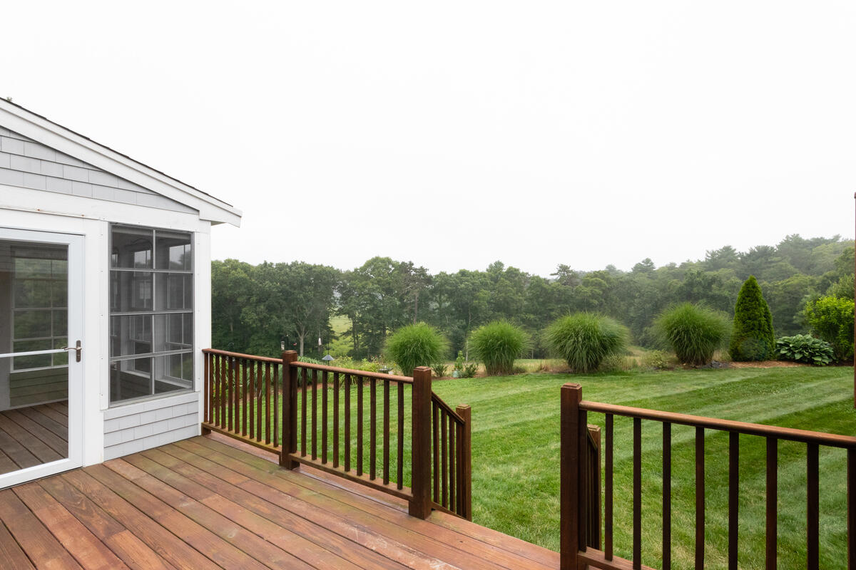 20 Prestwick Road Bourne, MA 02532 - Photo 13 of 29 a view of a balcony with yard