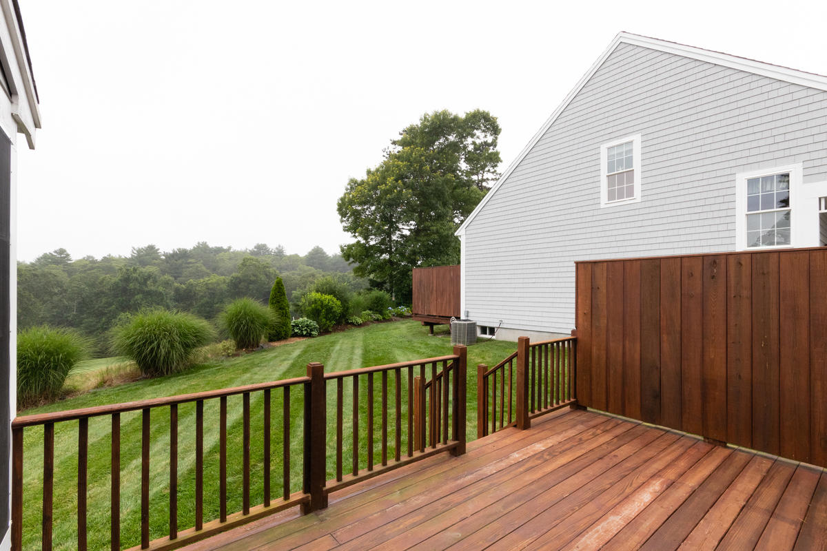 20 Prestwick Road Bourne, MA 02532 - Photo 14 of 29 a balcony with wooden floor and fence
