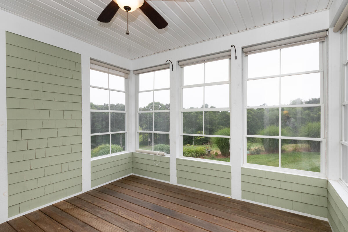 20 Prestwick Road Bourne, MA 02532 - Photo 19 of 29 a view of wooden floor and windows in a room