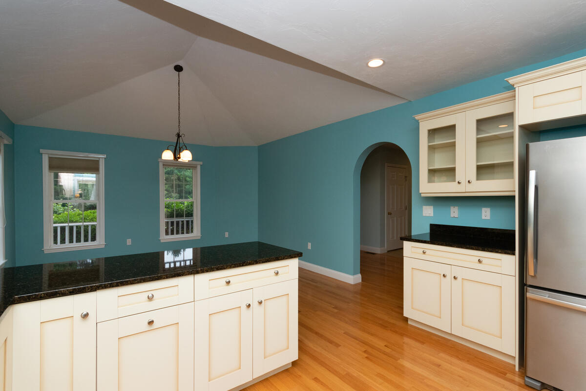 20 Prestwick Road Bourne, MA 02532 - Photo 4 of 29 a kitchen with sink and refrigerator