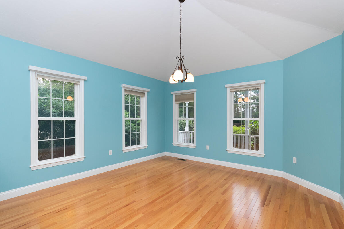 20 Prestwick Road Bourne, MA 02532 - Photo 9 of 29 a view of an empty room with a window and wooden floor