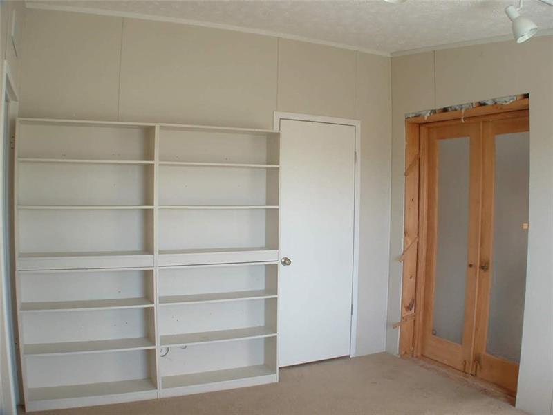 429 Burnsville Ridge Road Claysville, PA 15323 - Photo 16 of 21 Bedroom 3 (10x13) has built-in shelves, a 4x6 walk-in closet and provides access to the 2 story addition.