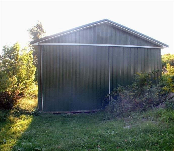 429 Burnsville Ridge Road Claysville, PA 15323 - Photo 3 of 21 The 20x40 pole building has 12 ft. sliding doors on both ends and has electric and access to water.