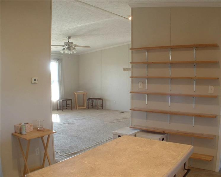 429 Burnsville Ridge Road Claysville, PA 15323 - Photo 8 of 21 Built-in shelves offer even more space for storage or display. The room in view to the left is the 13x15 living room that leads to one of the porches and that beautiful view.