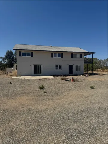 a front view of house with yard