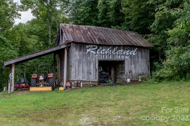 a view of an house with backyard tub and outdoor seating