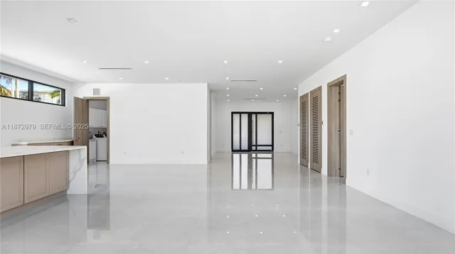 a view of a kitchen with a sink
