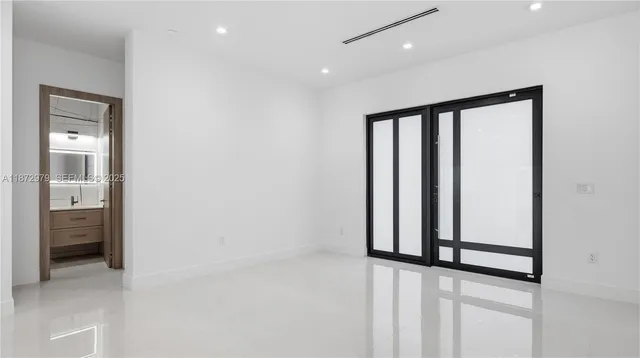 wooden floor in a hall with an entryway