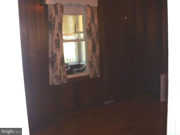1601 Wilson Point Road Middle River, MD 21220 - Photo 11 of 17 a close view of chair and door