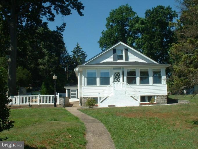 1601 Wilson Point Road Middle River, MD 21220 - Photo 3 of 17 a front view of a house with a yard
