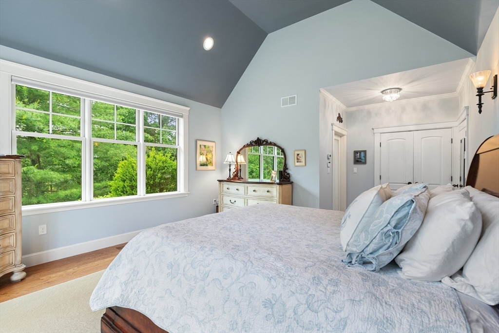 27 Whitehall Circle Beverly, MA 01915 - Photo 15 of 42 a bedroom with a bed and window