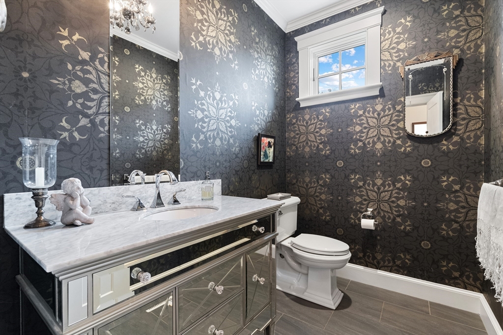 27 Whitehall Circle Beverly, MA 01915 - Photo 20 of 42 a bathroom with a sink a toilet and shower