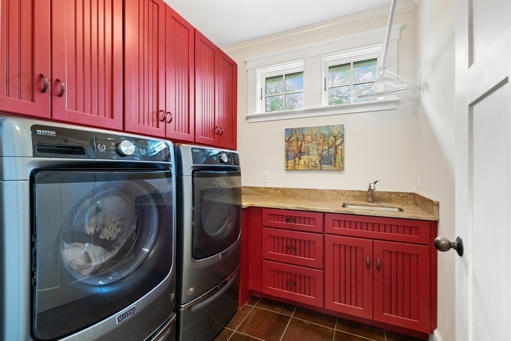 27 Whitehall Circle Beverly, MA 01915 - Photo 21 of 42 a kitchen with stainless steel appliances granite countertop a refrigerator and a stove