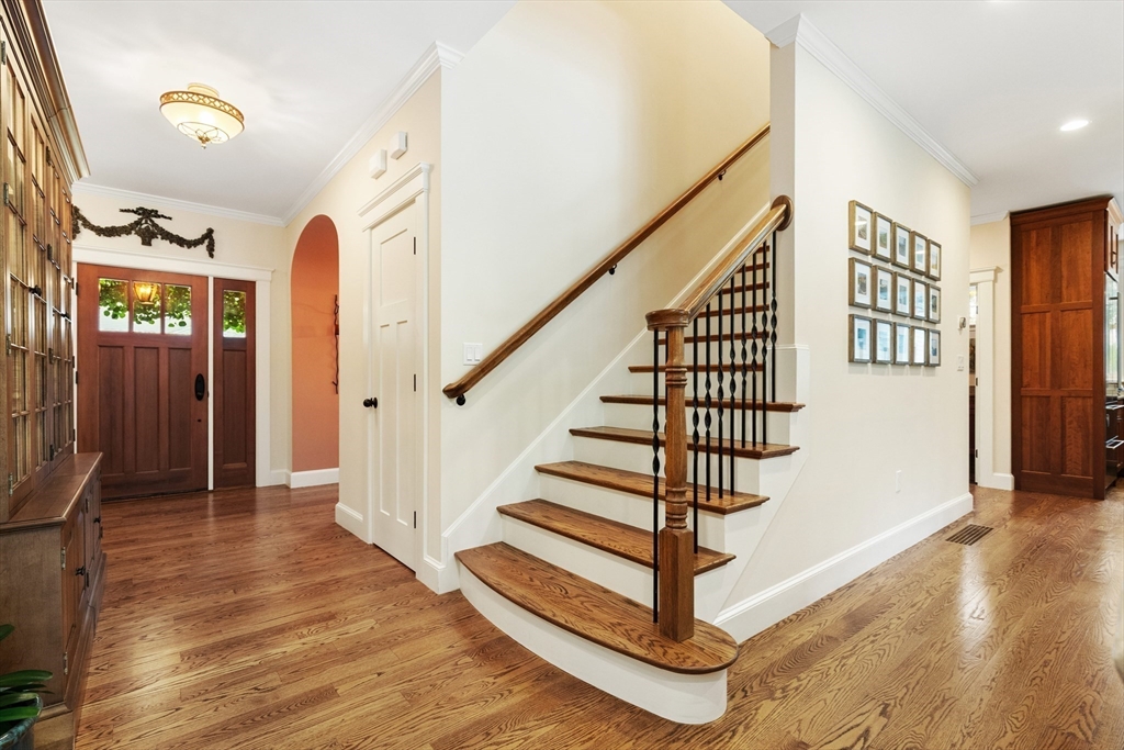 27 Whitehall Circle Beverly, MA 01915 - Photo 25 of 42 a view of entryway and hall with wooden floor