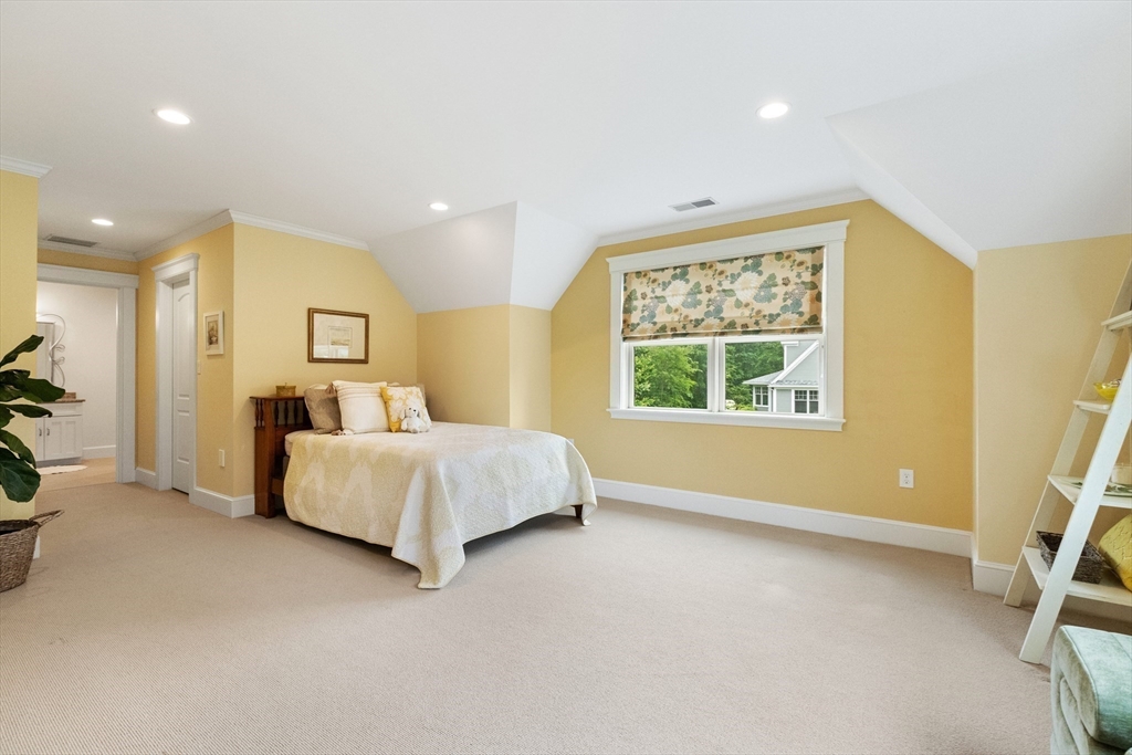 27 Whitehall Circle Beverly, MA 01915 - Photo 29 of 42 a bed room with a bed and a window