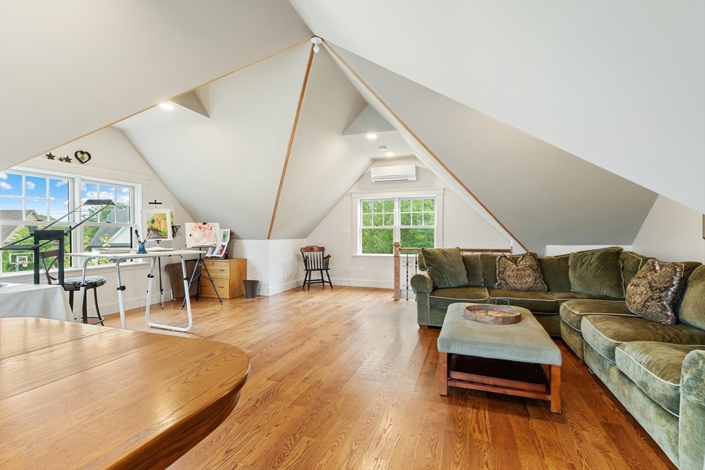 27 Whitehall Circle Beverly, MA 01915 - Photo 31 of 42 a living room with furniture and a large window