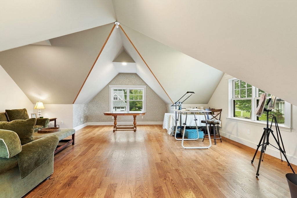 27 Whitehall Circle Beverly, MA 01915 - Photo 32 of 42 a living room with furniture and a table