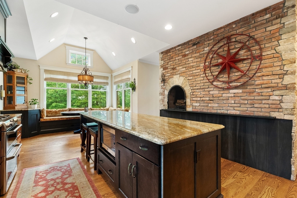 27 Whitehall Circle Beverly, MA 01915 - Photo 8 of 42 a kitchen with a sink and large window