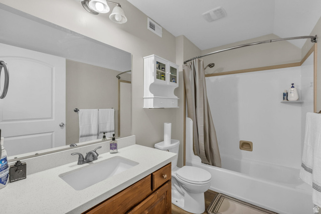 905 South Main Street, Unit G Layton, UT 84041 - Photo 18 of 36 Bathroom featuring vanity and shower / bath combination with curtain