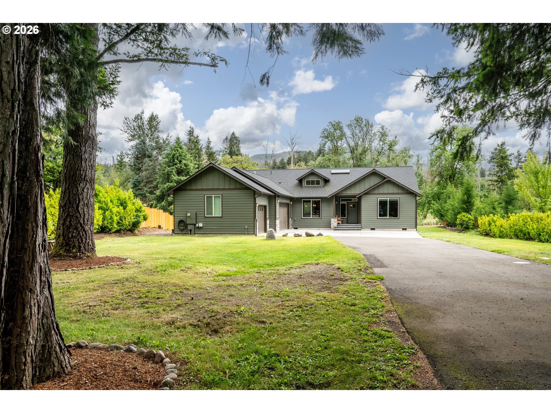 45542 South Gate Creek Road Vida, OR 97488 - Photo 25 of 46 a swimming pool with trees in the background