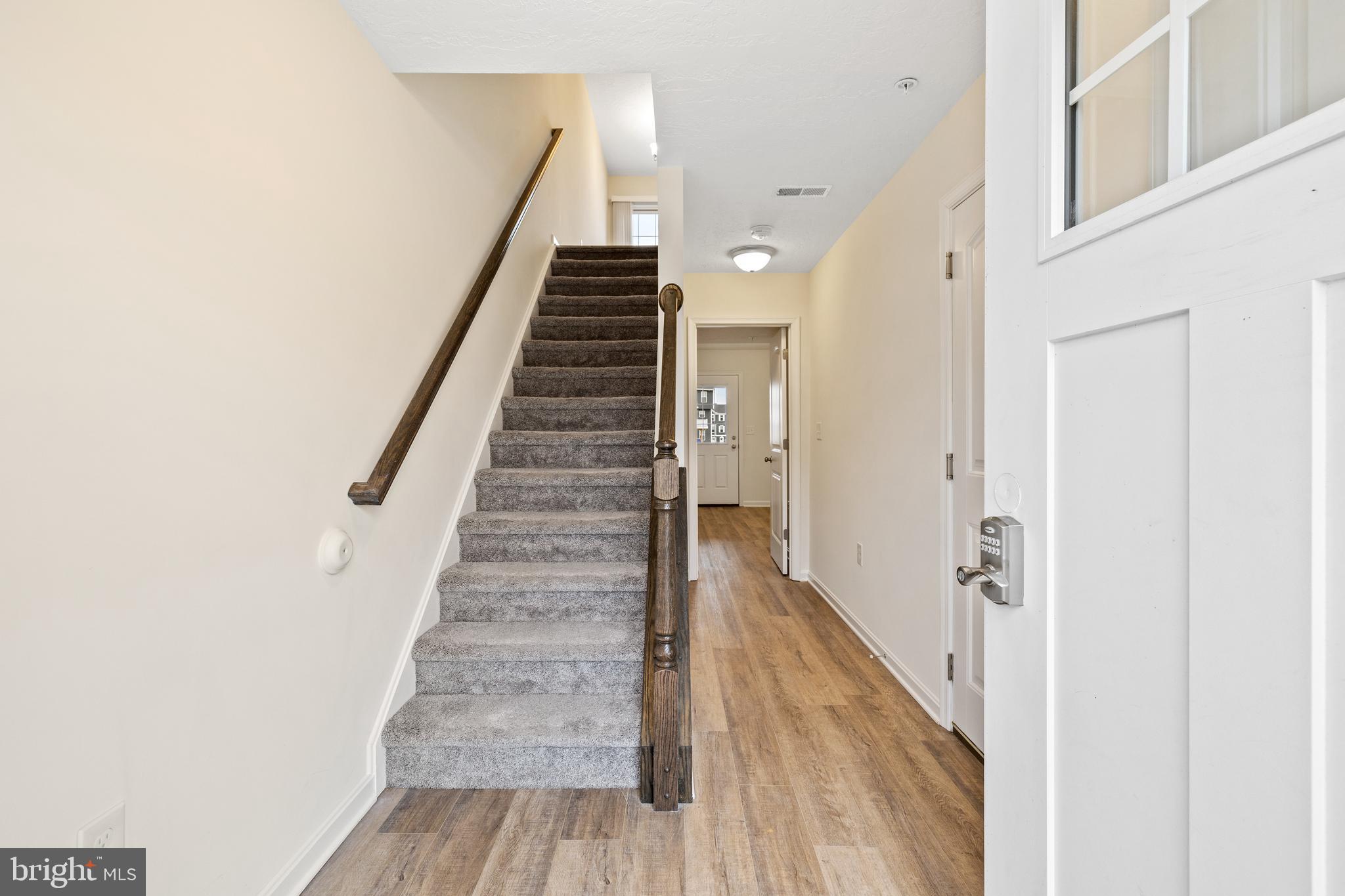 495 South Spring Garden Street, Unit 500 Carlisle, PA 17013 - Photo 3 of 26 a view of a hallway with wooden floor and entryway