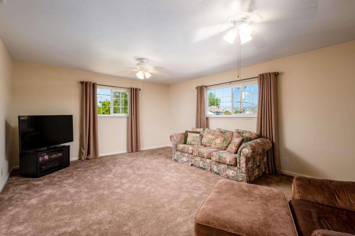 265 Bieber Drive San Jose, CA 95123 - Photo 18 of 28 a living room with furniture and a flat screen tv