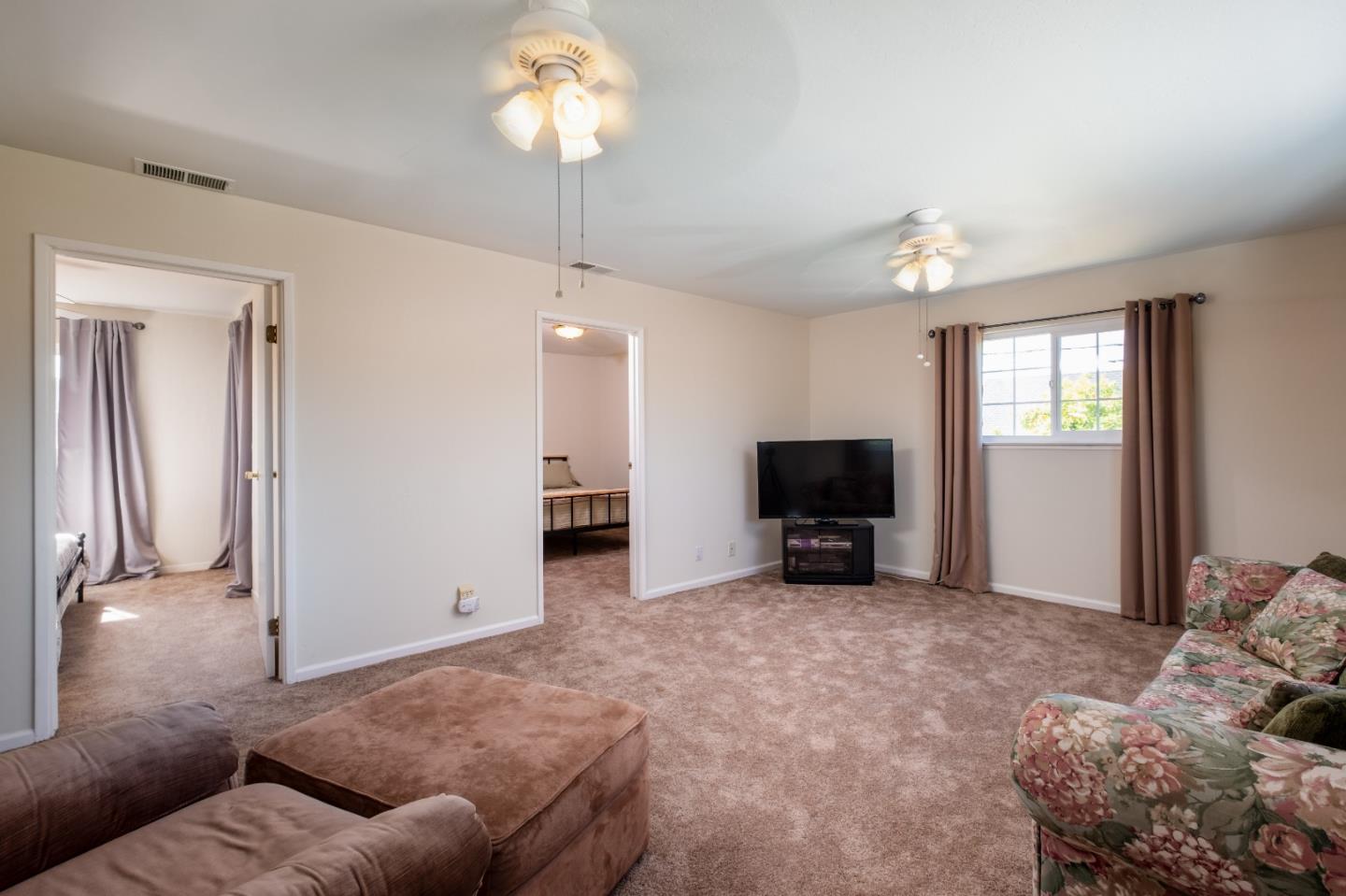 265 Bieber Drive San Jose, CA 95123 - Photo 20 of 28 a living room with furniture and a flat screen tv