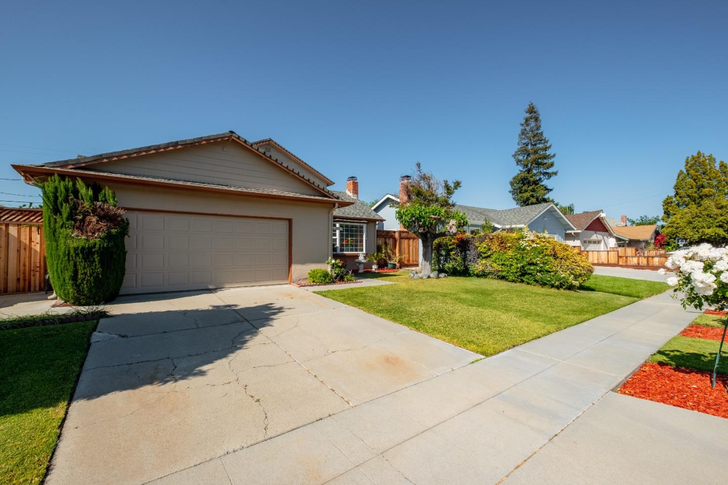 265 Bieber Drive San Jose, CA 95123 - Photo 3 of 28 a front view of a house with a yard
