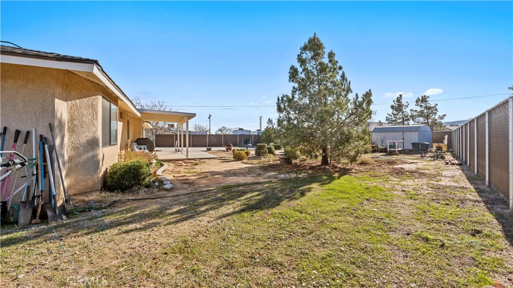 11639 Pagosi Road Apple Valley, CA 92308 - Photo 29 of 37 a view of backyard of the house