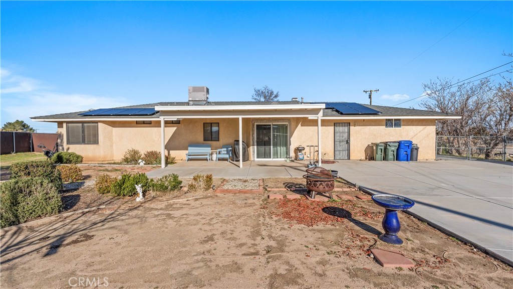 11639 Pagosi Road Apple Valley, CA 92308 - Photo 30 of 37 a view of a house with backyard porch and sitting area