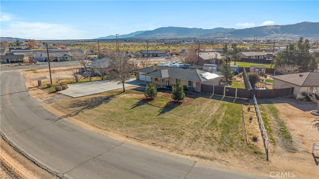 11639 Pagosi Road Apple Valley, CA 92308 - Photo 32 of 37 a view of a swimming pool with an ocean view