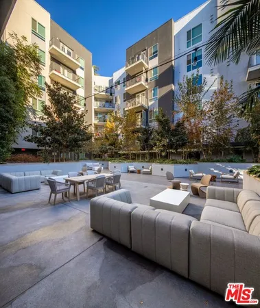 a building outdoor space with patio furniture
