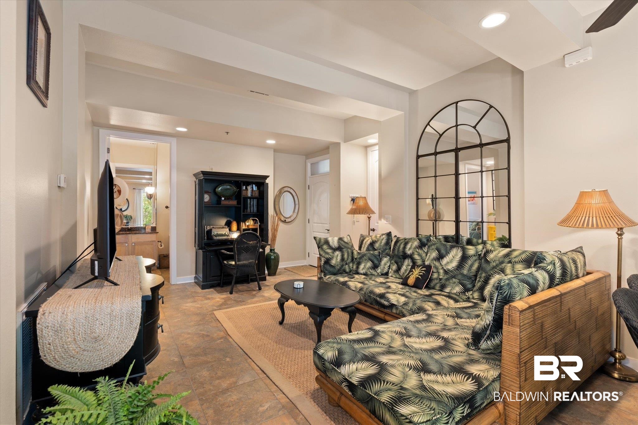 1430 Regency Road, Unit C103 Gulf Shores, AL 36542 - Photo 5 of 29 Living room with recessed lighting and stone finish flooring