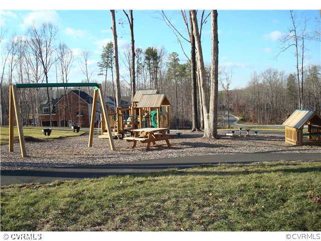 3212 Handley Road Midlothian, VA 23113 - Photo 6 of 9 a view of a yard with a slide