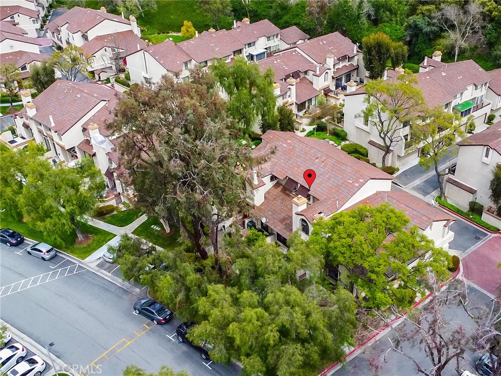 33 Wildflower Place Phillips Ranch, CA 91766 - Photo 47 of 49 an aerial view of a house with a yard and garden
