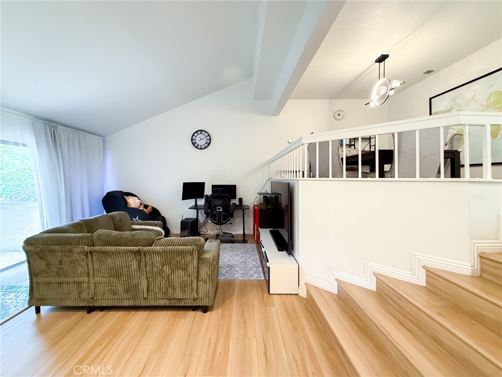 33 Wildflower Place Phillips Ranch, CA 91766 - Photo 10 of 49 a living room with furniture and a wooden floor