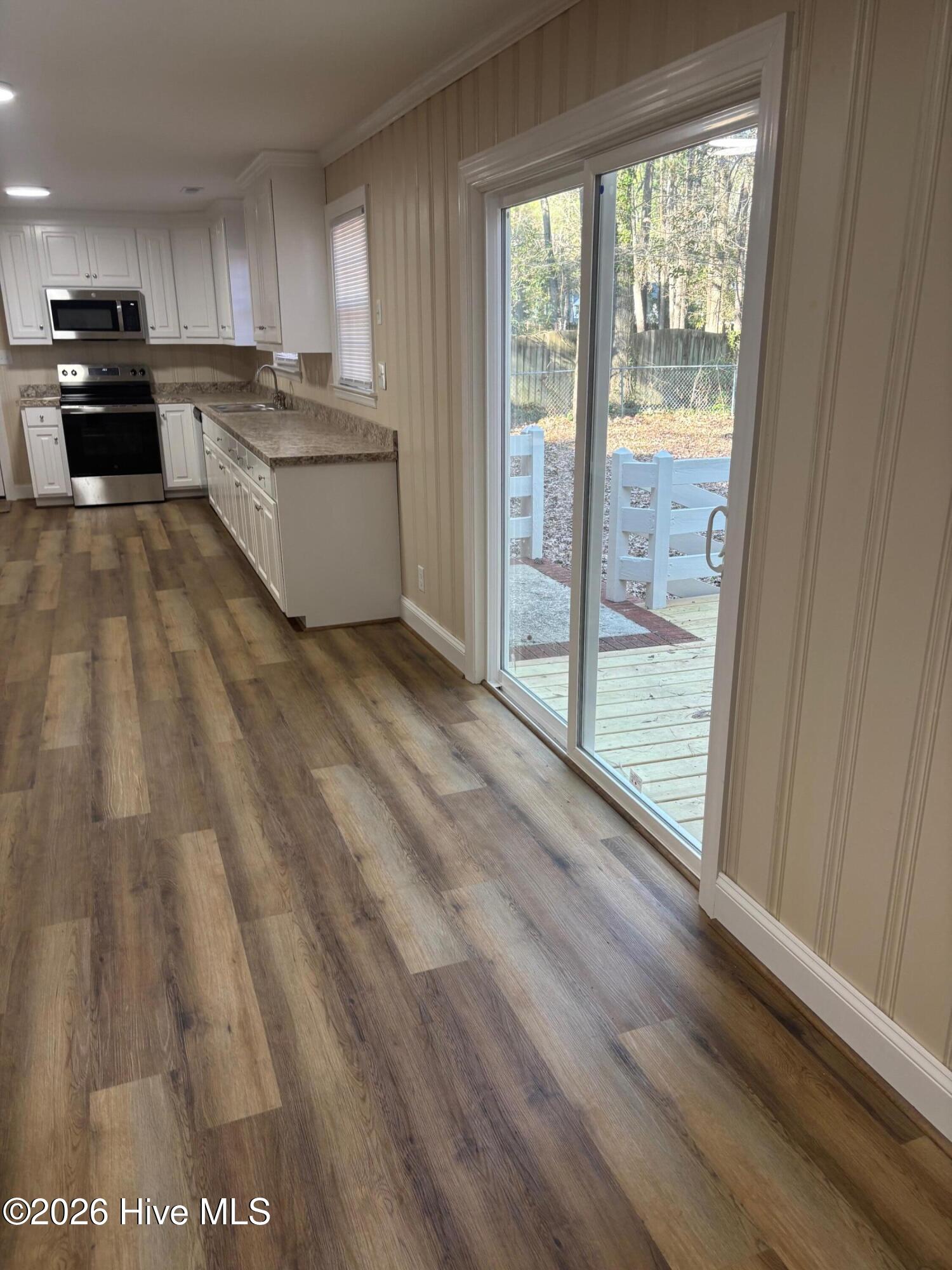 1606 Adams Street North Wilson, NC 27893 - Photo 9 of 25 8_Den into Kitchen