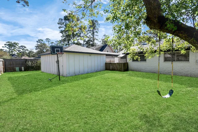 a view of a backyard with a garden