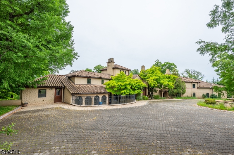 50 Rock Spring Road West Orange, NJ 07052 - Photo 2 of 50 a front view of a house with a yard and garage